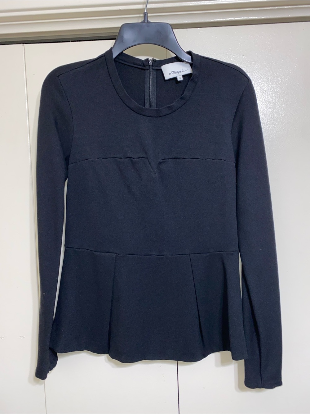 Black Long-Sleeve Peplum Knit Top